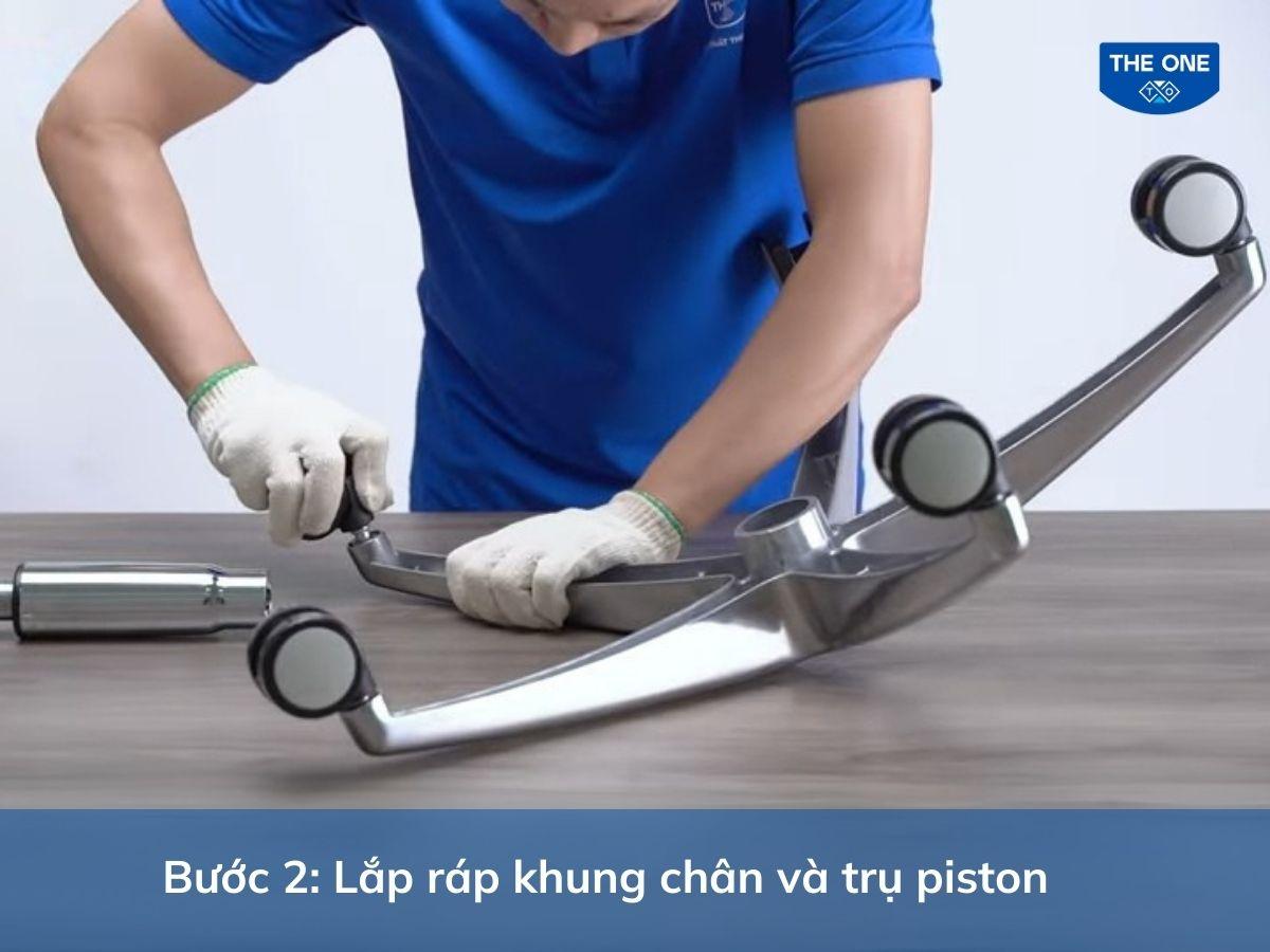 Thực hiện lắp bánh xe và trụ piston