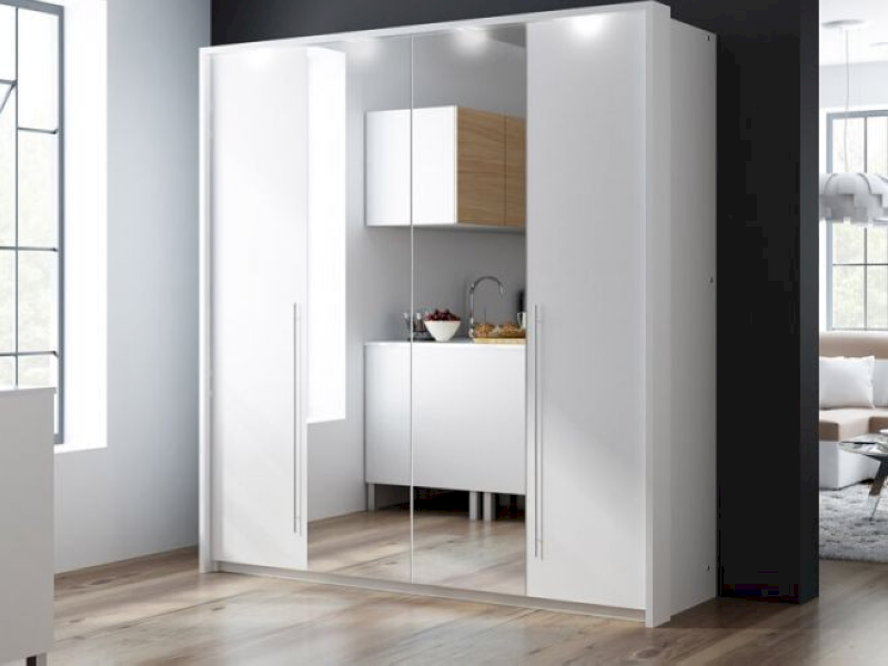 Chọn các loại tủ quần áo có thiết kế gương lắp ở mặt trong cánh cửa giúp loại bỏ mọi tác động tiêu cực đến tâm lý và giấc ngủ của bạn. (Nguồn: Internet)